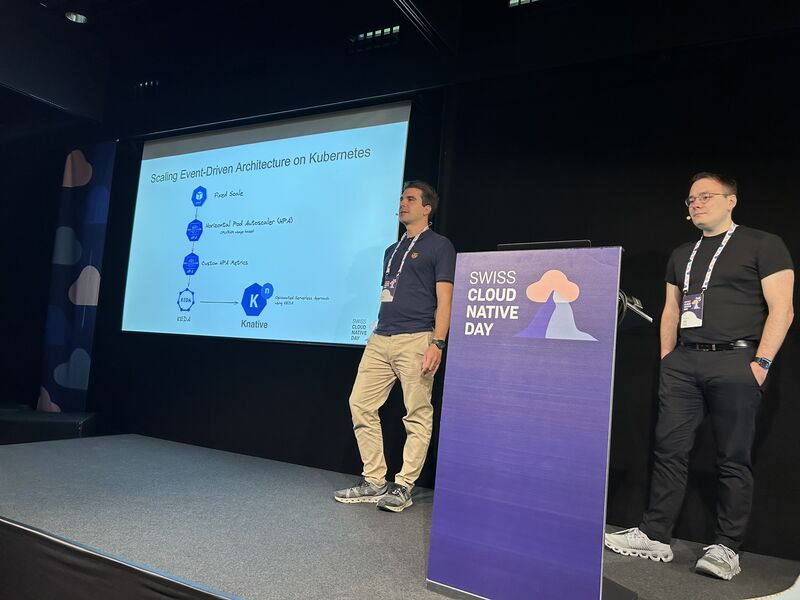 Fabrizio Lazzaretti and Linus Basig speaking at Cloud Native Day Switzerland 2025